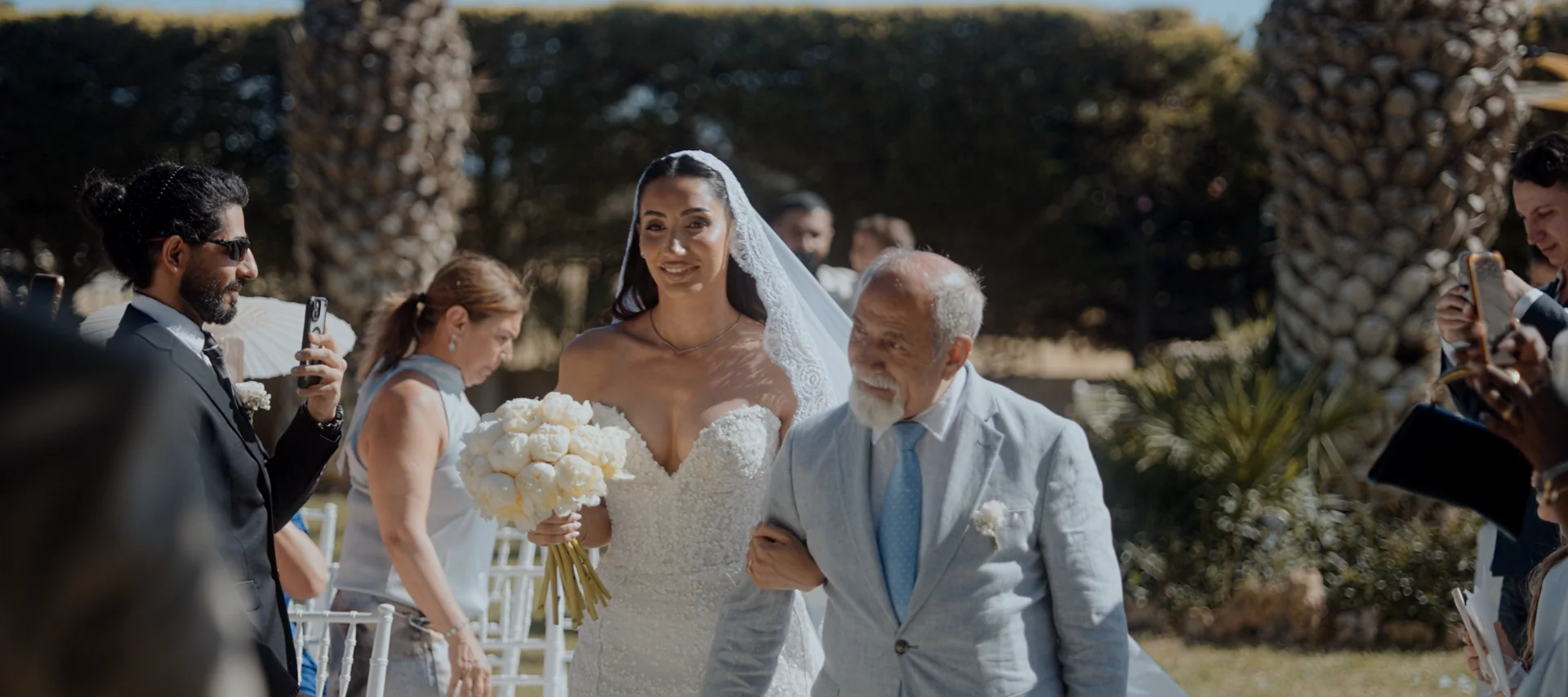 A quiet moment above the Aegean during their Island Art and Taste wedding ceremony