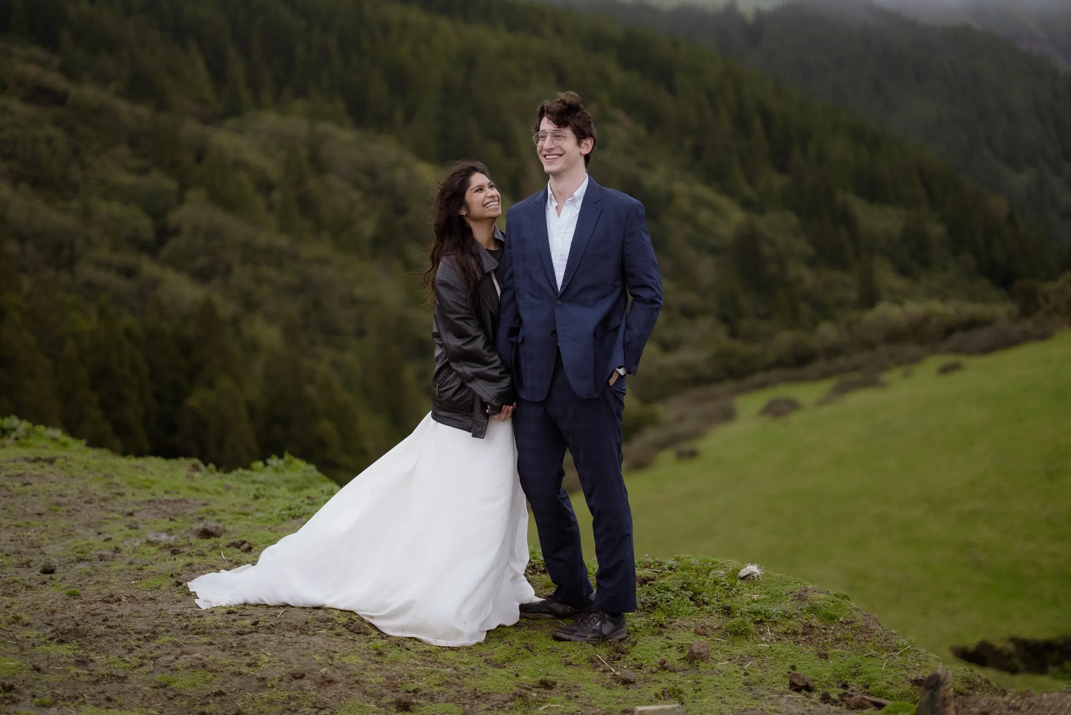 Editorial couple overlooking a green volcanic valley on São Miguel