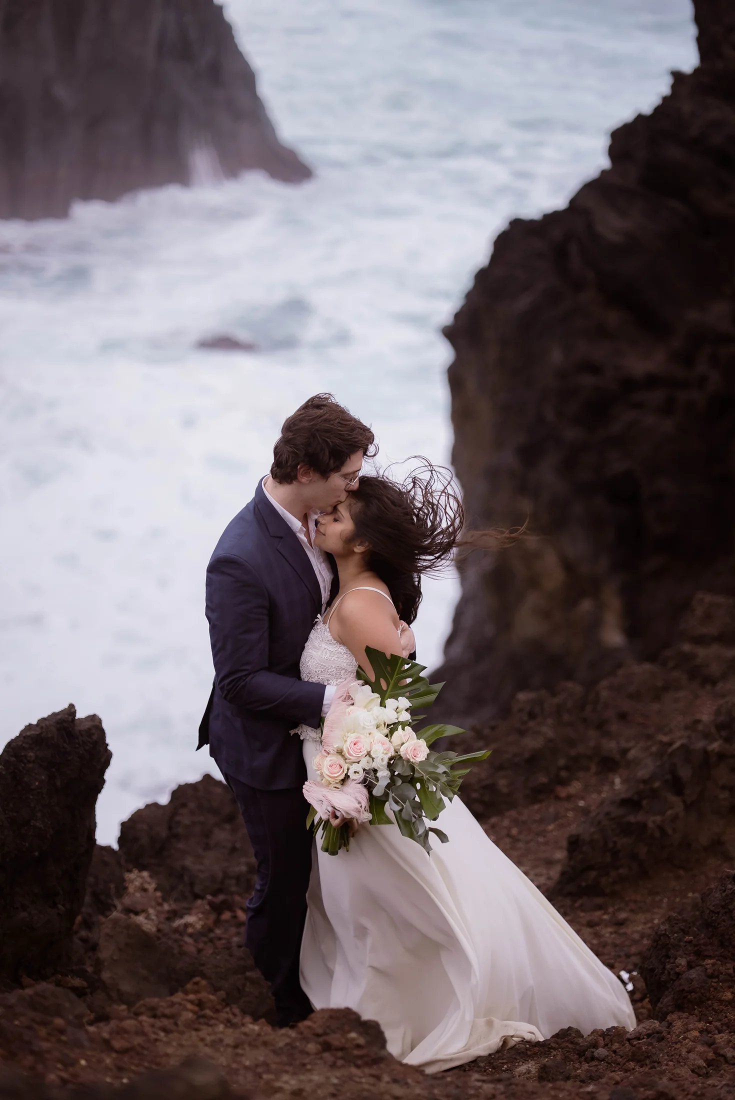 Editorial couple on the black volcanic coast of São Miguel
