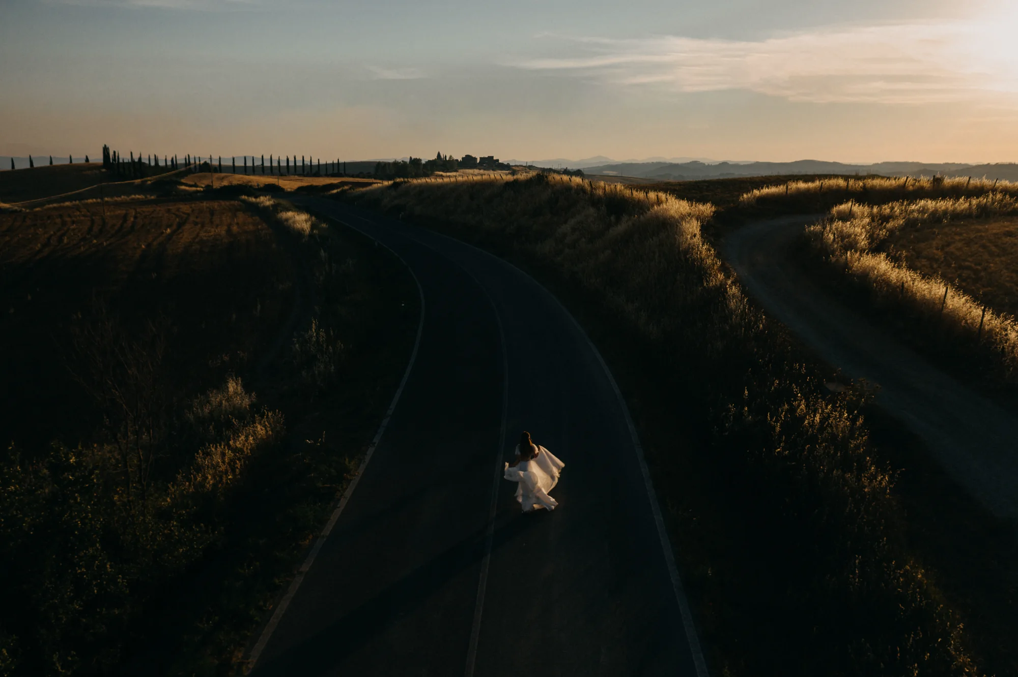 Aerial view of a couple in the hills of Tuscany