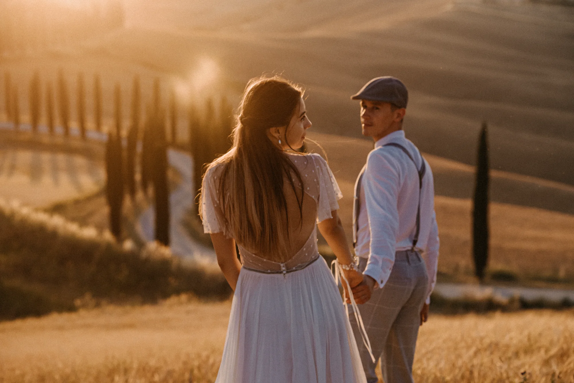 Couple at golden hour filmed by a Tuscany wedding videographer
