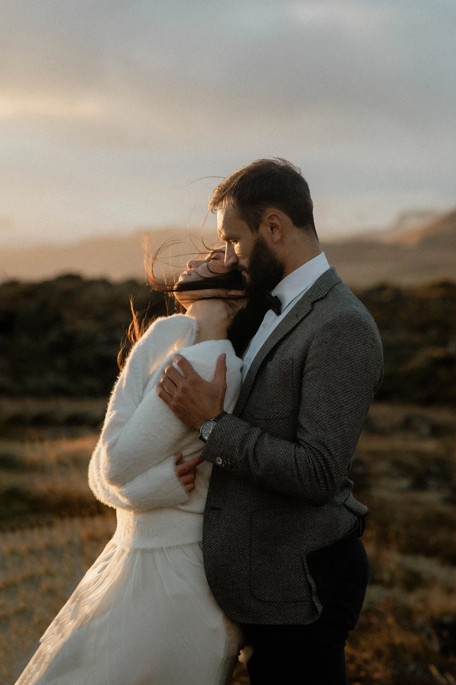 Couple embracing in the Icelandic wind