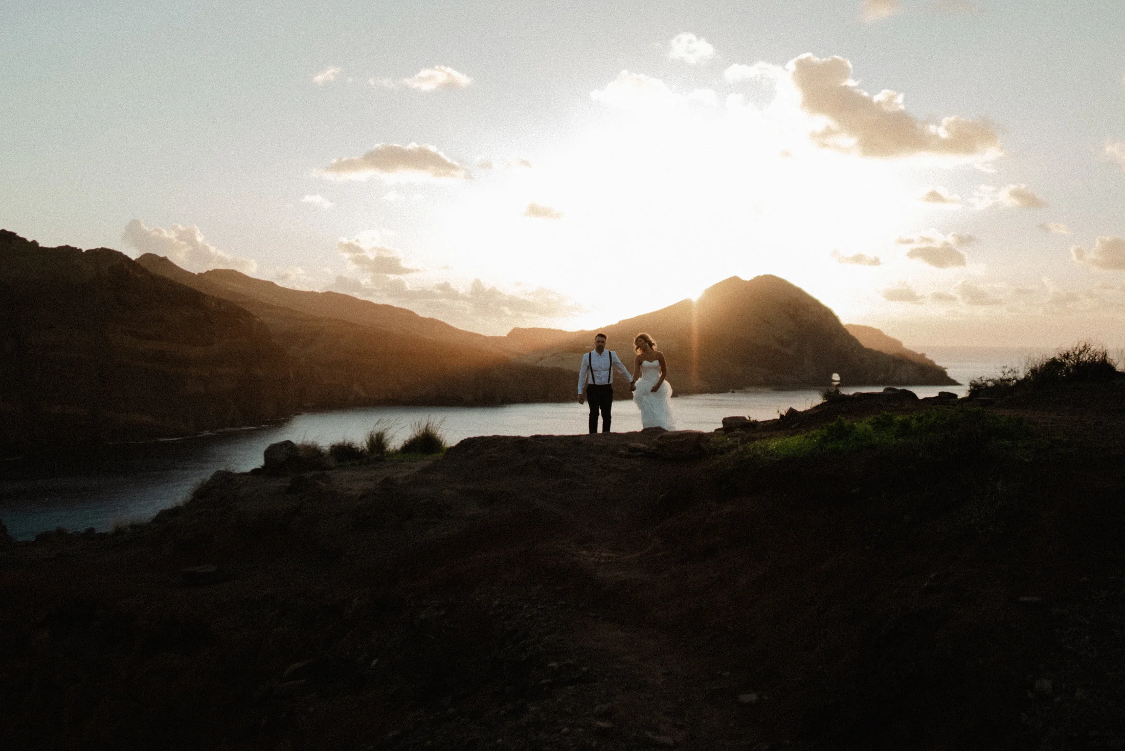Couple at sunset above the Atlantic coast