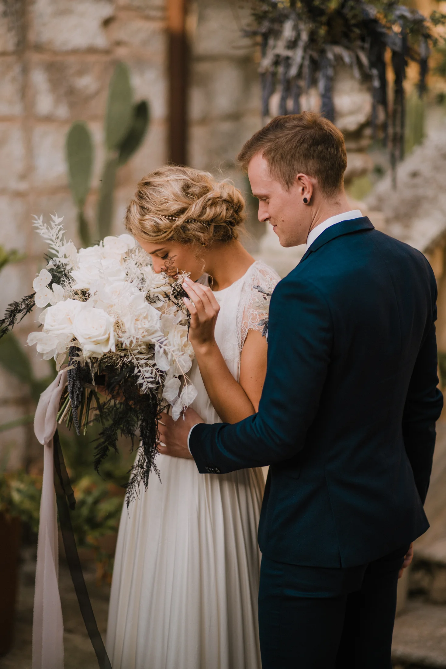 Bride with sculptural wedding flowers in Diso, Puglia