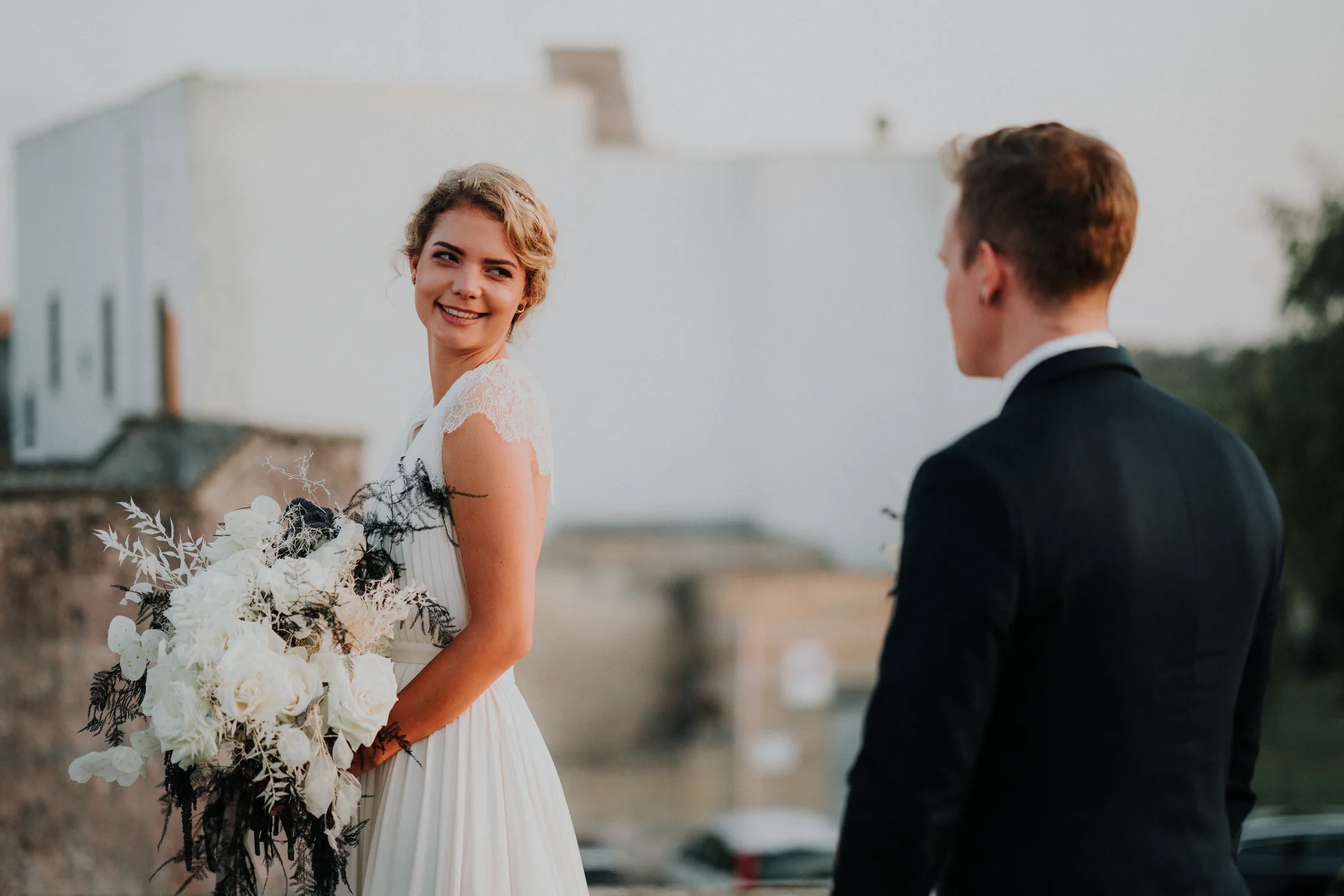 Editorial wedding portrait in the white stone town of Diso, Puglia